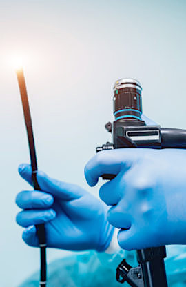 Endoscopy at the hospital. Doctor holding endoscope before gastroscopy Endoscopie